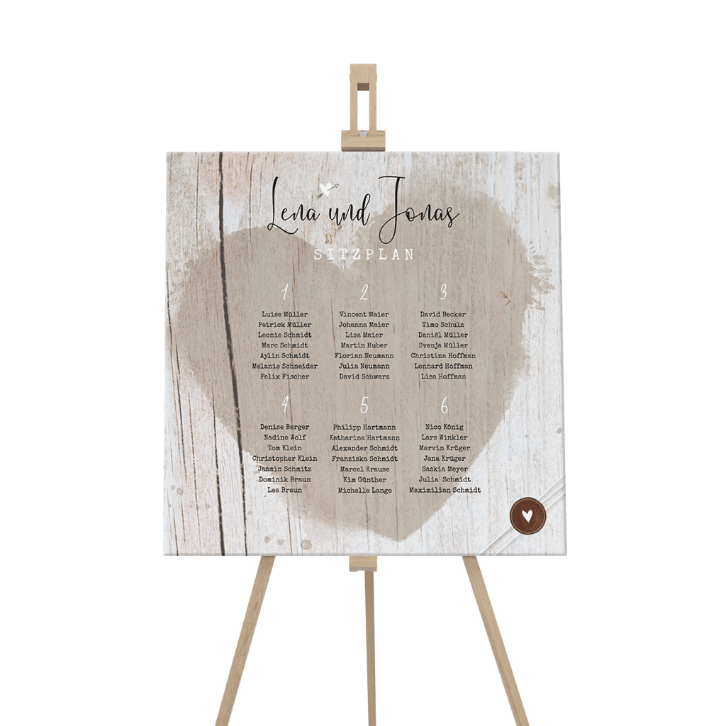 Sitzplan Schild mit Herz auf Holzhintergrund