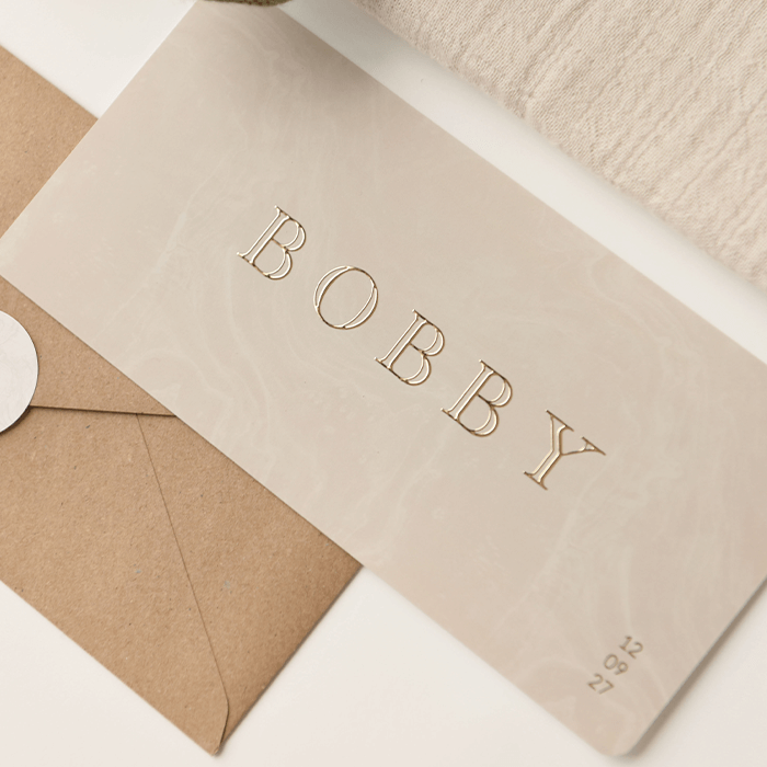 Luxe unisex geboortekaartje met marmer-look en goudfolie