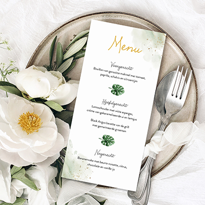 Menukaart met bladeren en gouden spetters