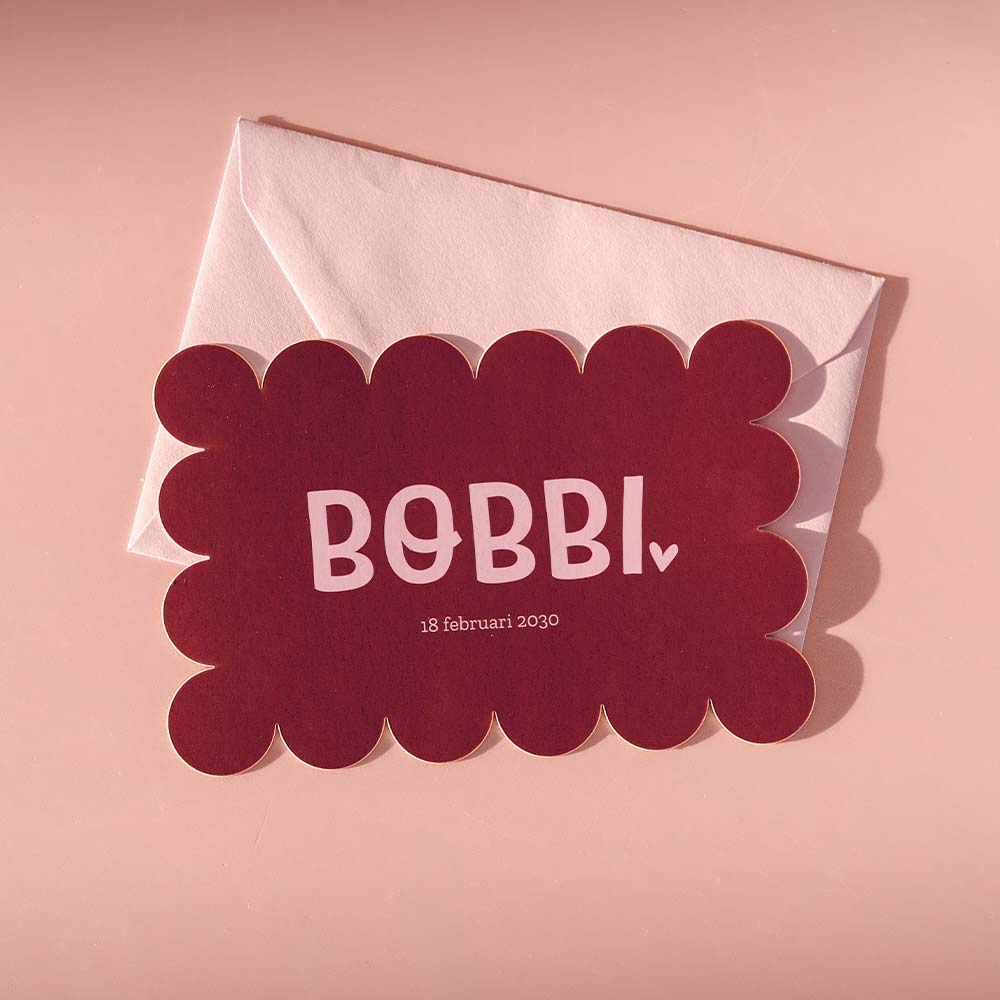 Origineel geboortekaartje meisje in trendkleuren met golvende rand