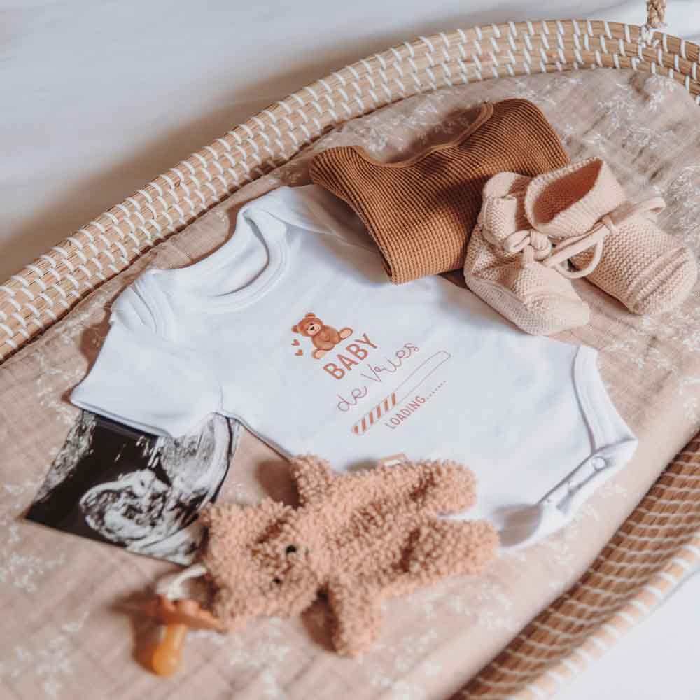 Romper met zwangerschapsaankondiging en beertjes