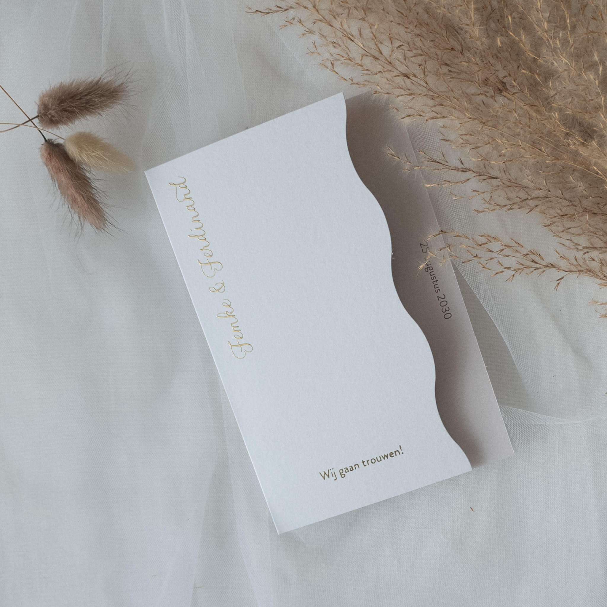 Trouwkaart golfvorm wit goud