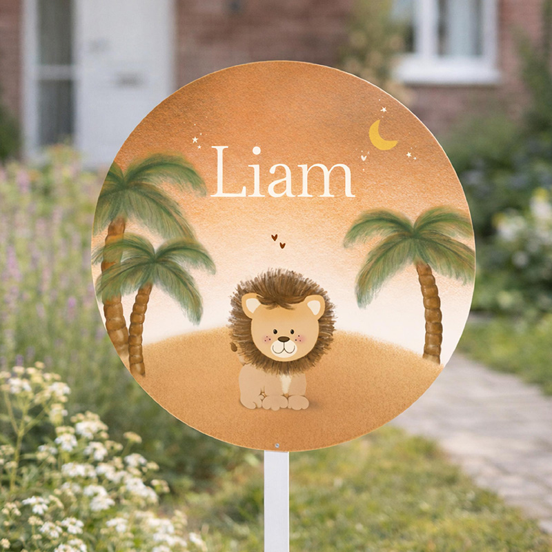 Tuinbord geboorte rond jongen met leeuwtje en palmbomen