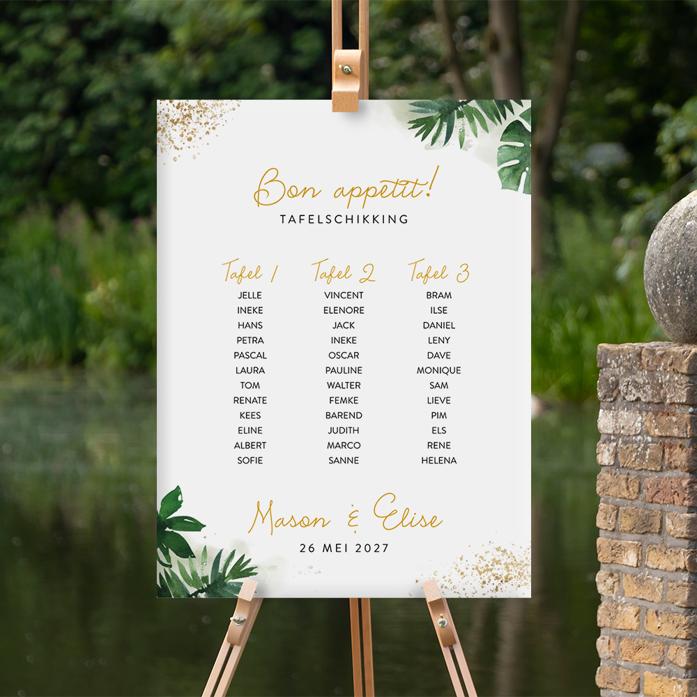 Tafelschikking bord met tropische bladeren