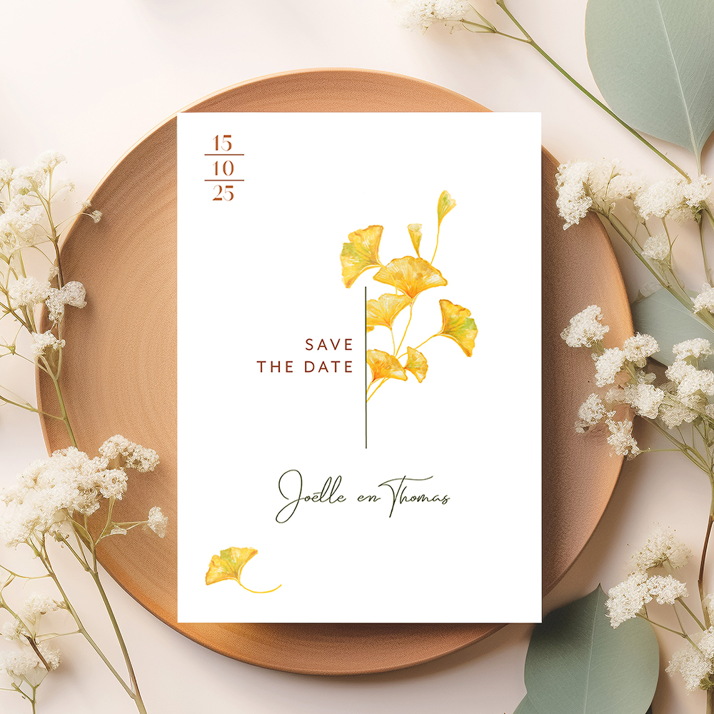 Save the date kaart met aquarelschildering van een ginkgo takje.