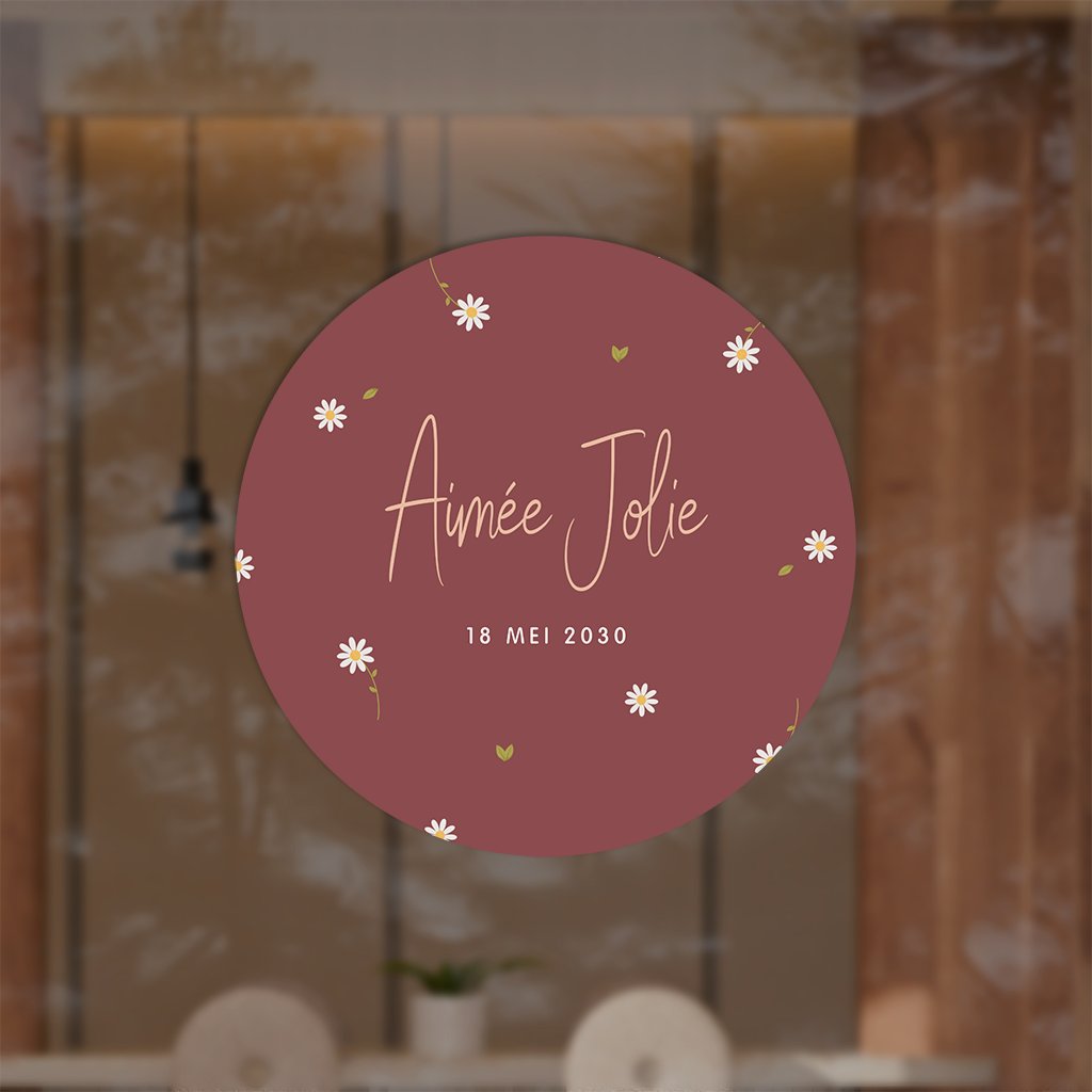 Raamsticker rond rood met madeliefjes