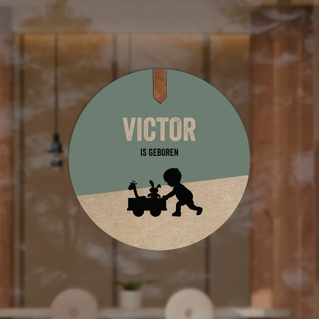 Raamsticker rond groen met silhouetje jongen