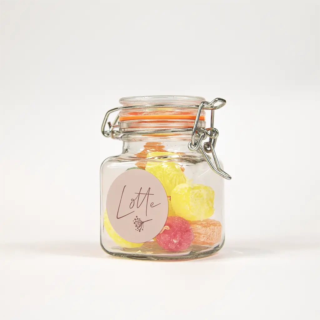 Roze naamsticker met bloemetje - per 25 stuks