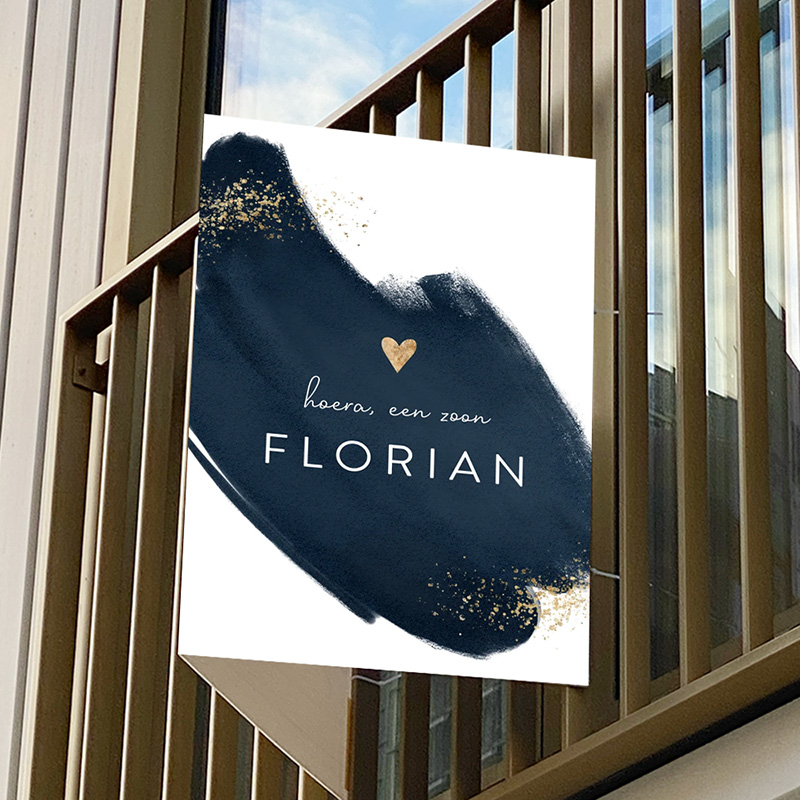 Blauw geboortebord met goudkleurige spetters en waterverf