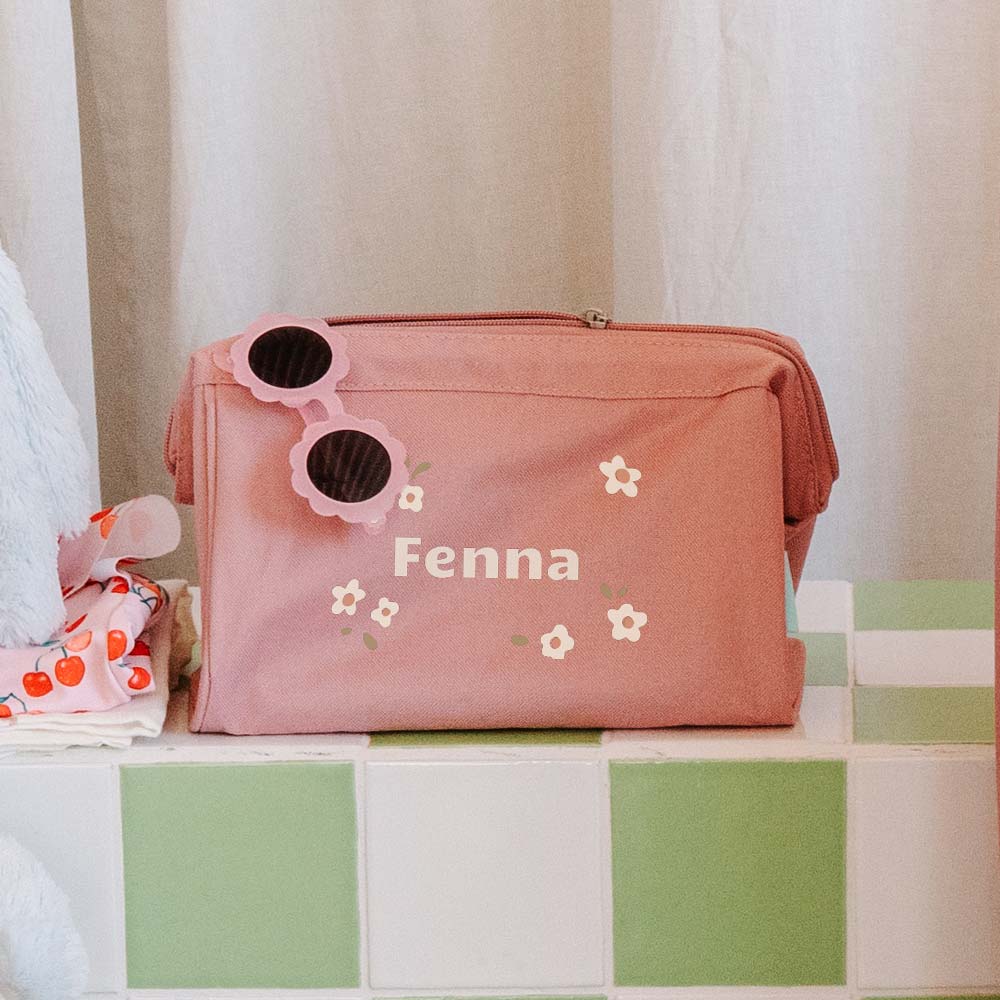 Toilettas met bloemen en naam