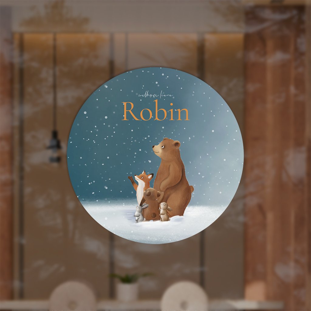 Raamsticker rond met winterdieren in de nacht