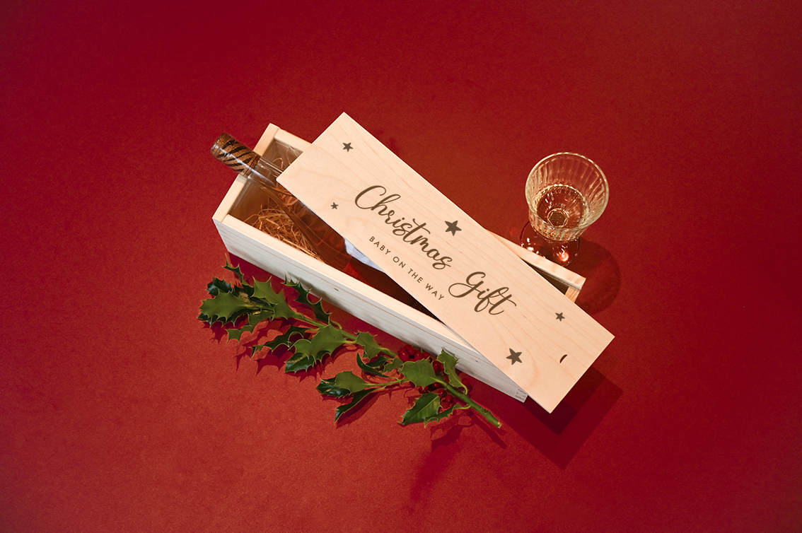 Zwangerschapsaankondiging Kerst op houten wijnkist