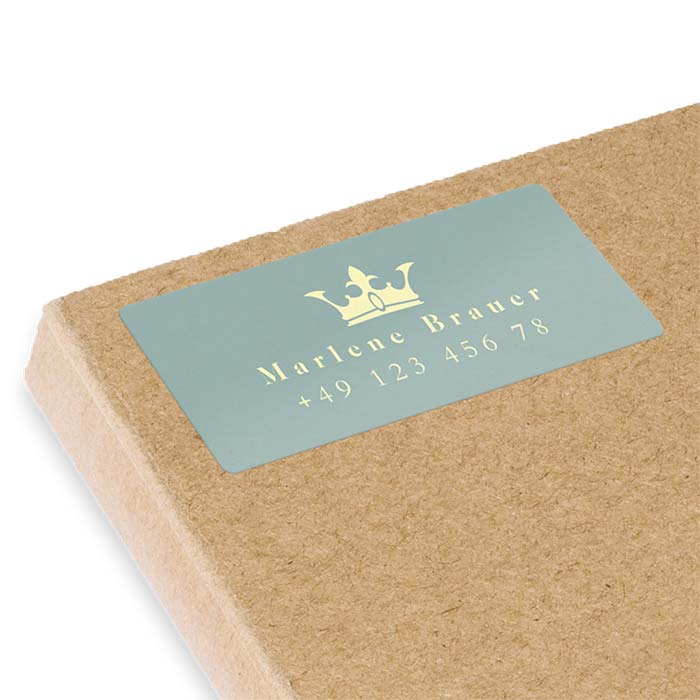 Namensaufkleber mit Krone und Telefonnummer