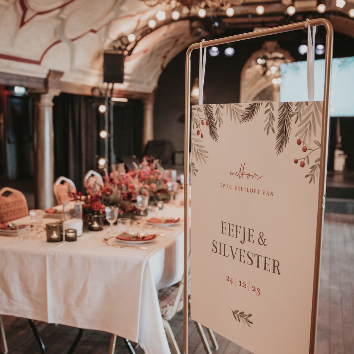 Welkomstbord bruiloft kerst groen takjes
