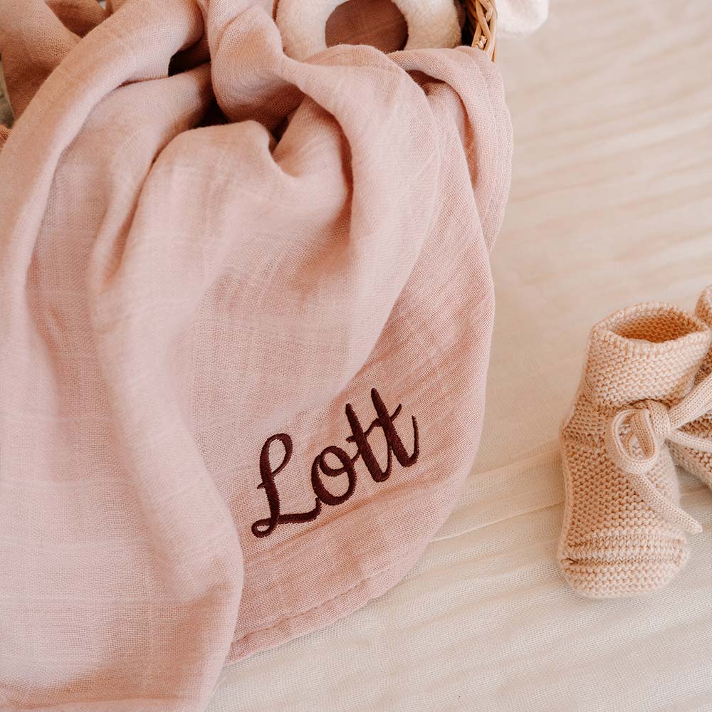 Hydrofiele doek met naam geborduurd