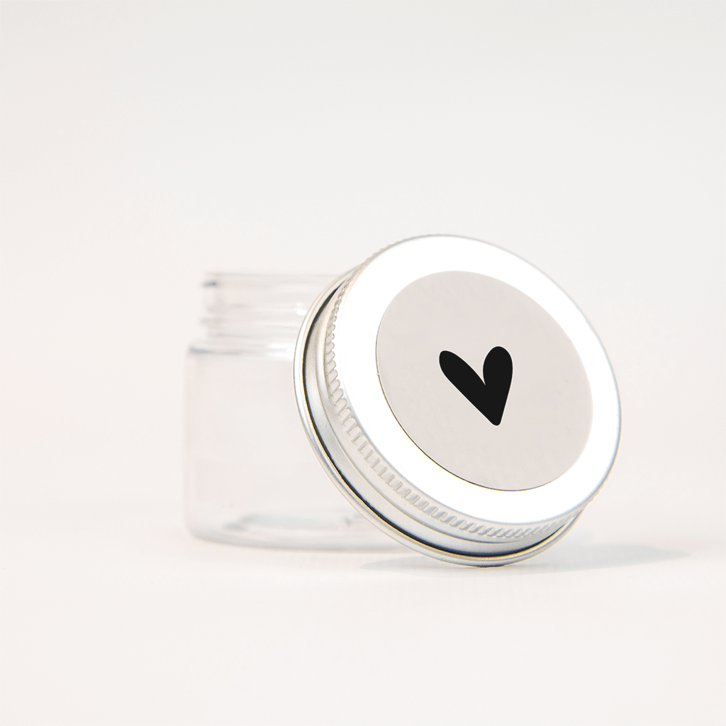 Sticker met zwart hart op roze - vel van 25 stuks