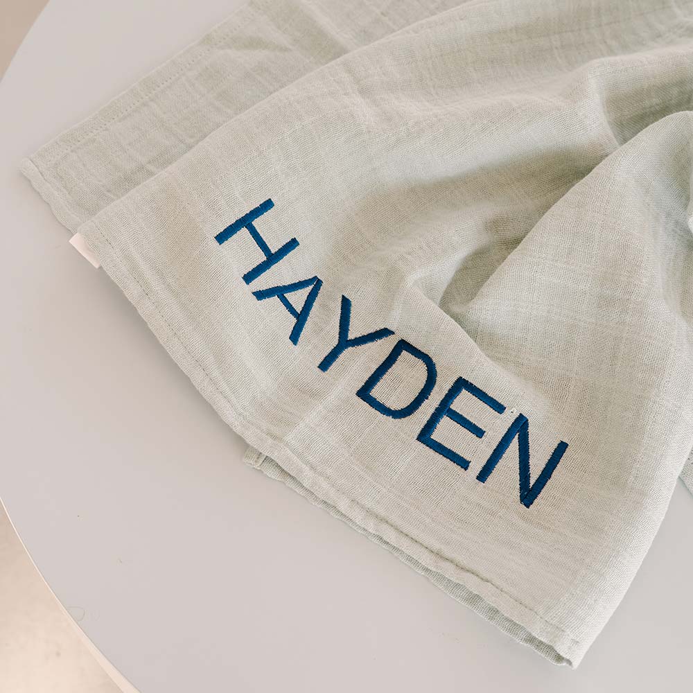 Hydrofiele doek met geborduurde naam 