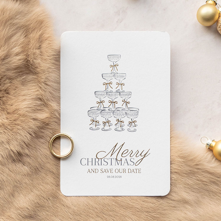 Save the Date kerst met champagnetoren en strikjes