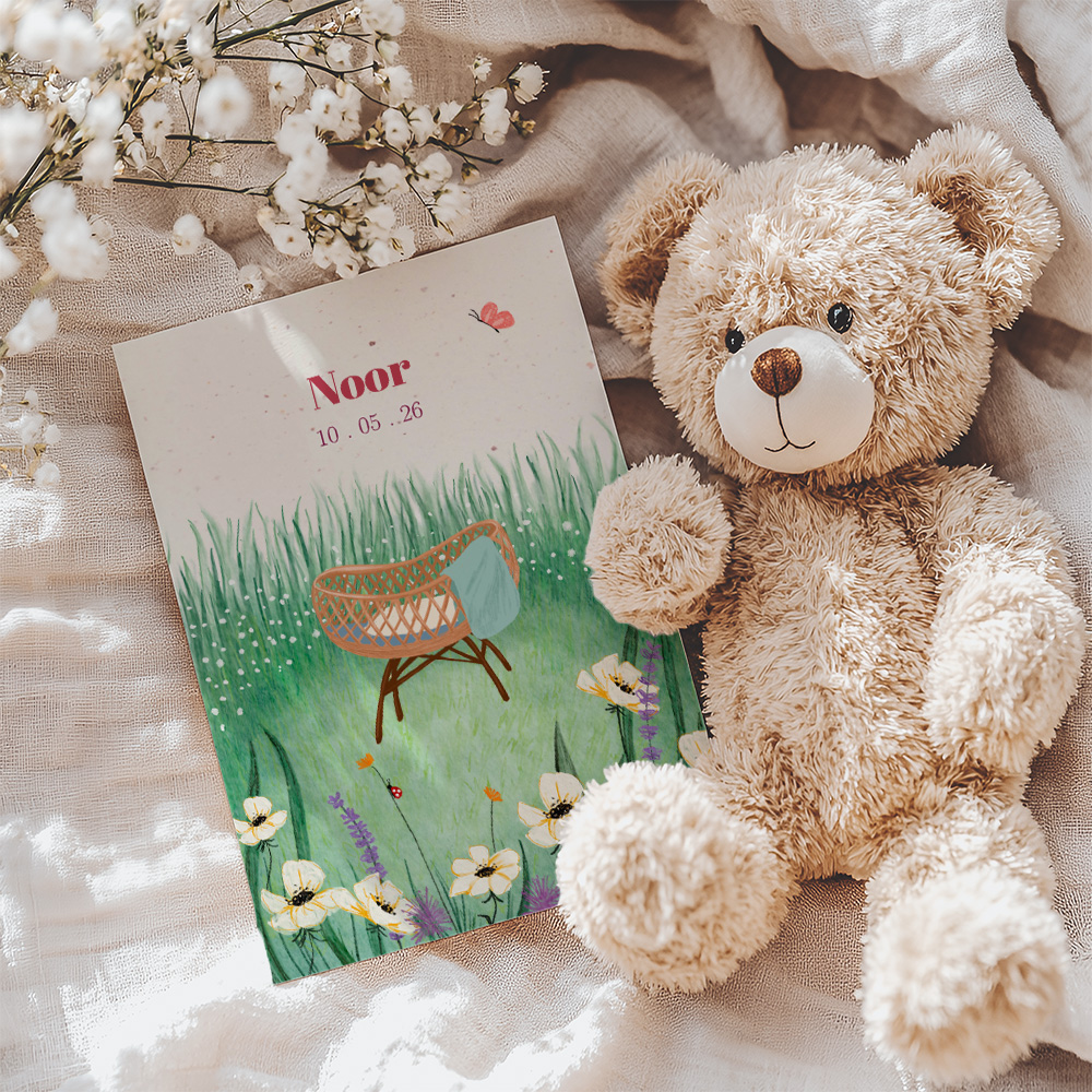 Geboortekaartje voorjaar met bloementuin en wiegje