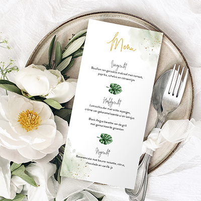 Menukaart met bladeren en gouden spetters