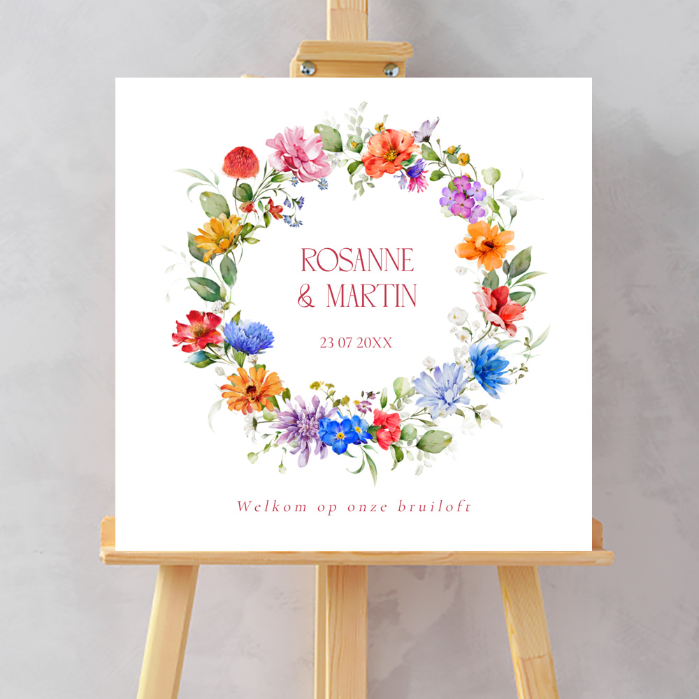 Bruiloftsbord kleurrijke bloemenkrans Blossoming Flowers