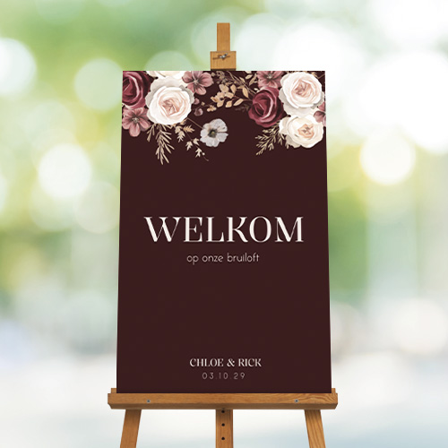 Welkomstbord voor een bruiloft met rozen