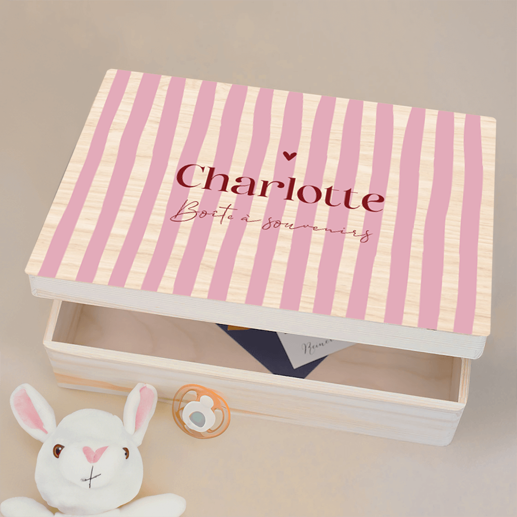 Boîte à souvenirs avec traits roses