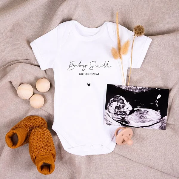Romper bekendmaking zwangerschap in zwart/wit