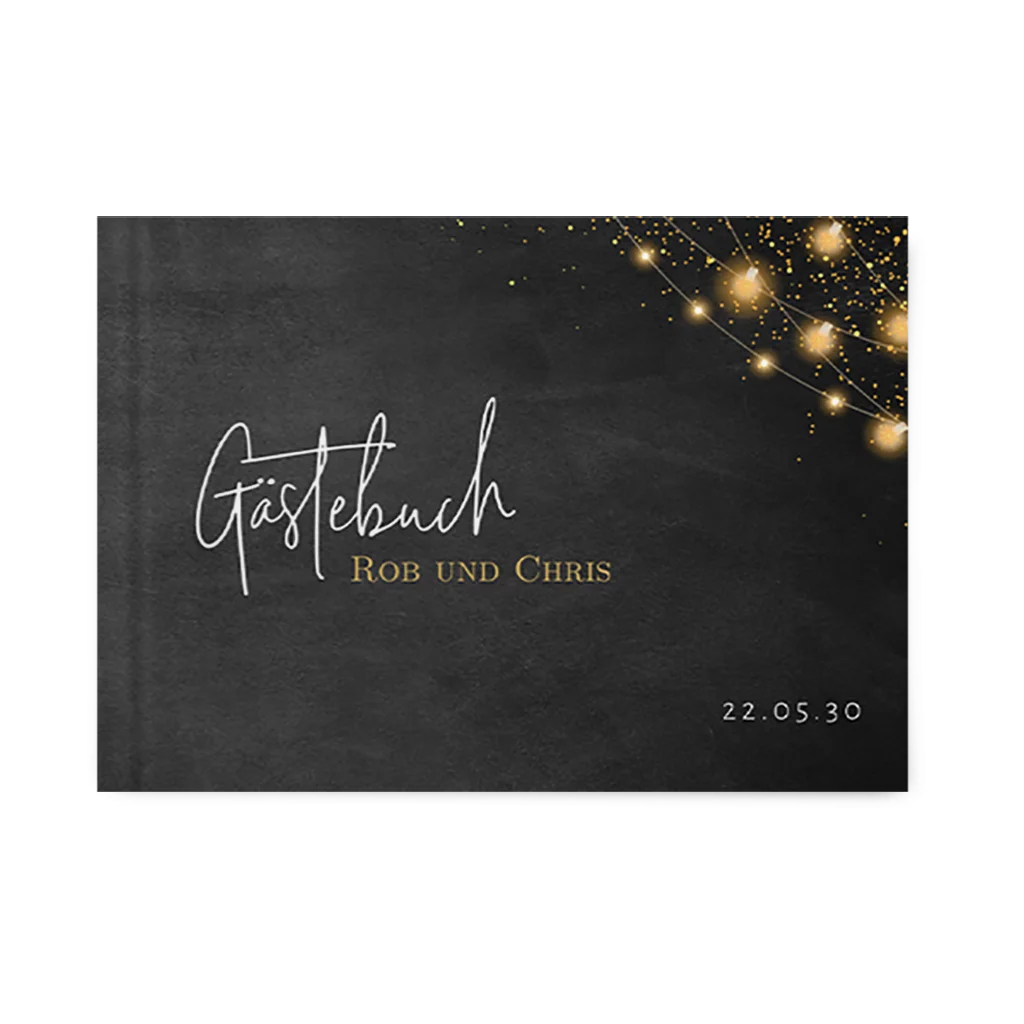 Gästebuch mit Lichterkette und schwarzem Hintergrund