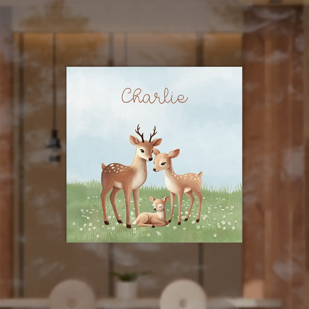 Raamsticker met hertengezin in gras en bloemen