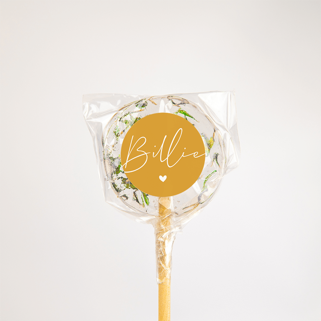 Vrolijke sticker in mosterdgeel met naam in sierlijke letters