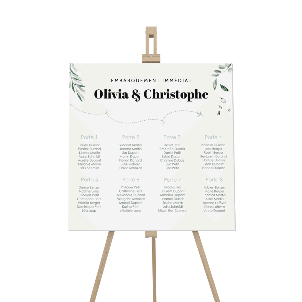 Plan de table avec des feuilles d'eucalyptus et un avion