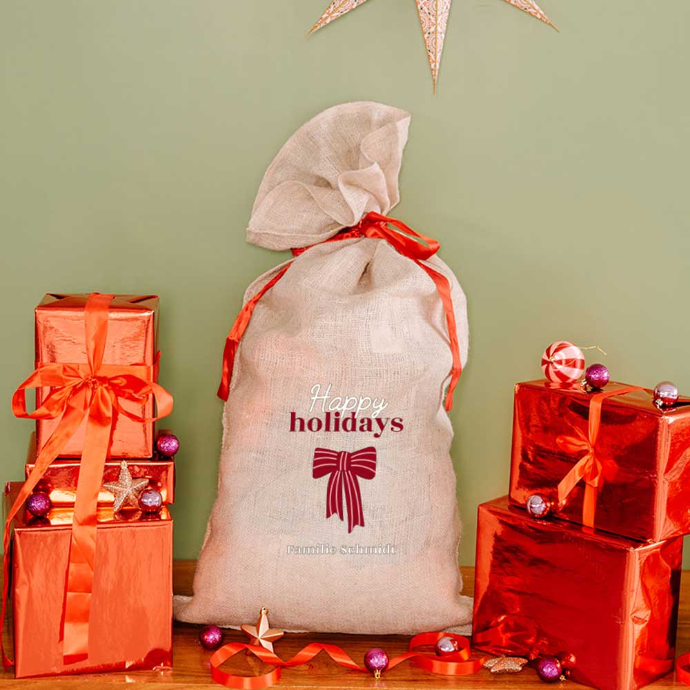 Gepersonaliseerde jute kerstzak met strik