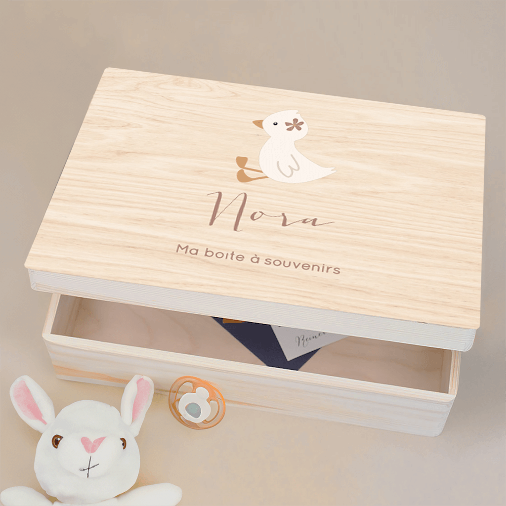 Boîte à souvenirs avec un caneton et une fleur