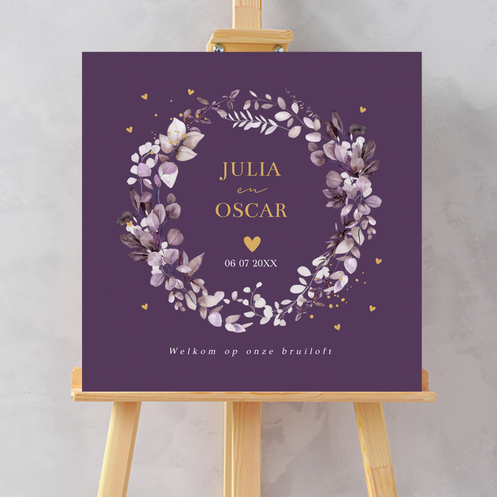Bruiloftsbord paars botanisch krans bladeren