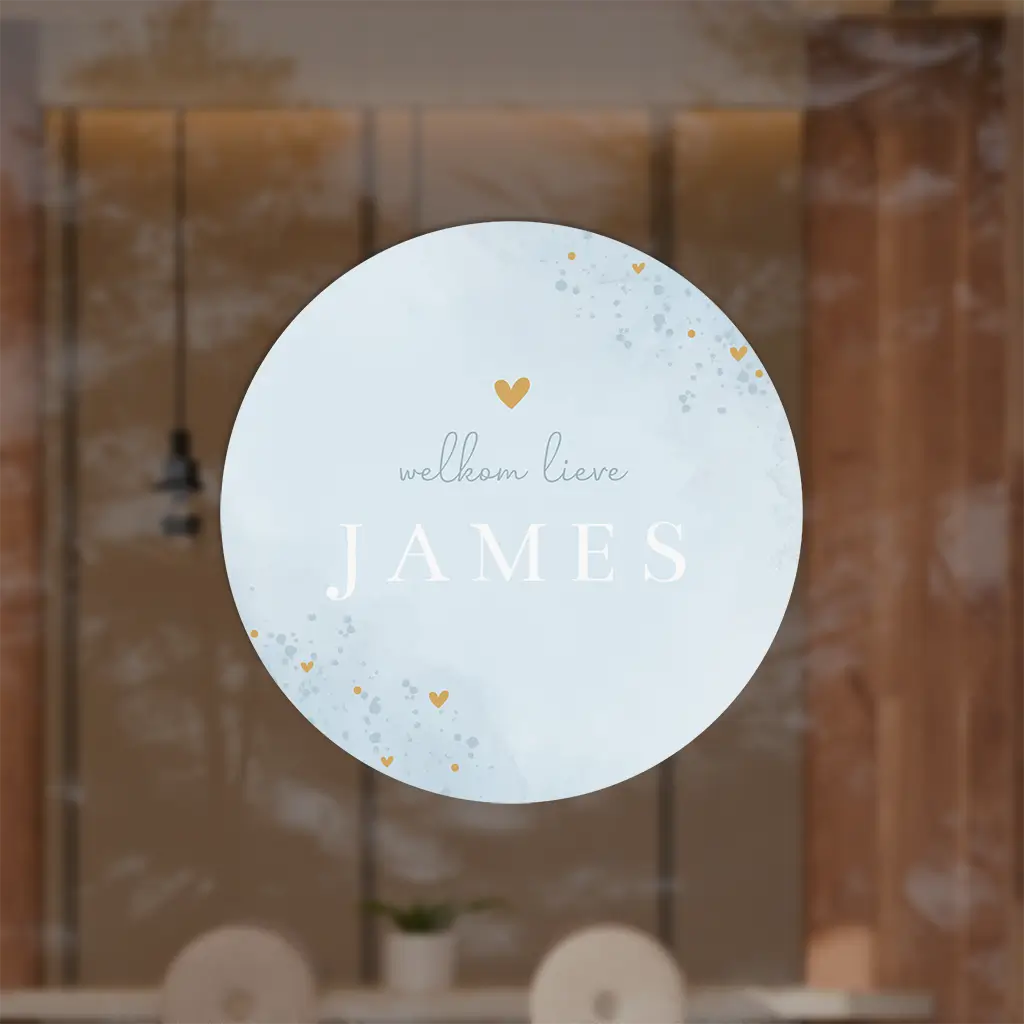 Raamsticker rond met lichtblauwe watercolour en spetters
