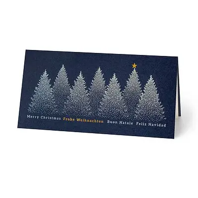 Geschäftliche Weihnachtskarte schneebedeckte Tannenreihe