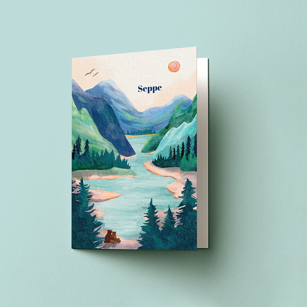 Geboortekaartje met berglandschap en twee kleine beertjes gevouwen