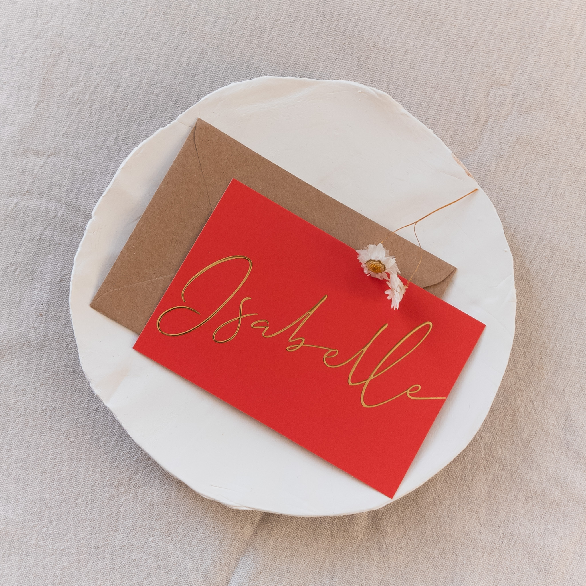 Warm oranje geboortekaartje met goudfolie