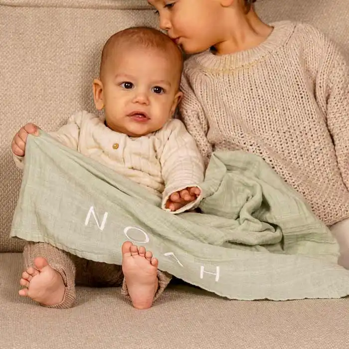 Hydrofiele doek met naam geborduurd