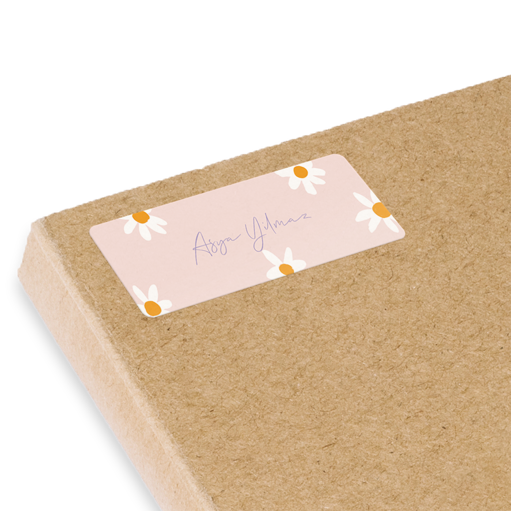 Namensaufkleber Einschulung mit Blümchen auf rosa Hintergrund