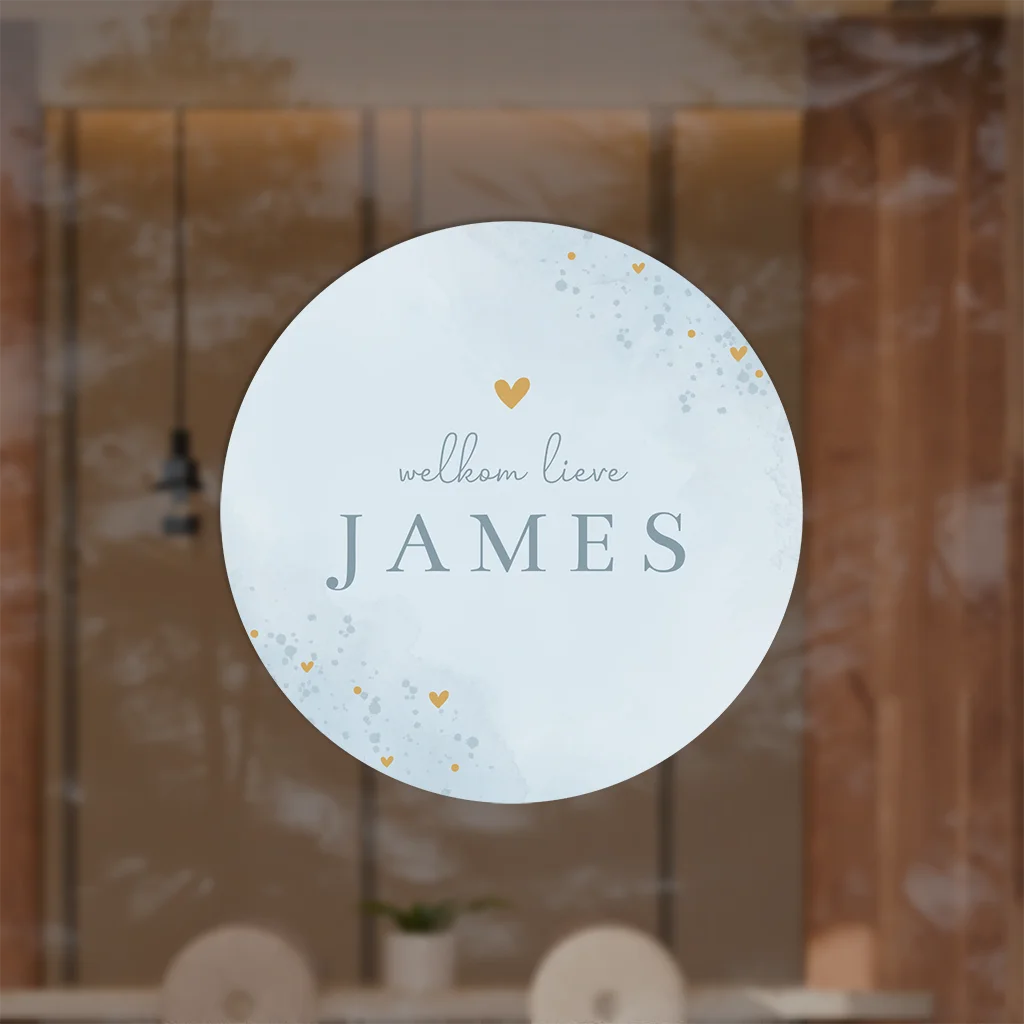 Raamsticker rond met lichtblauwe watercolour en spetters