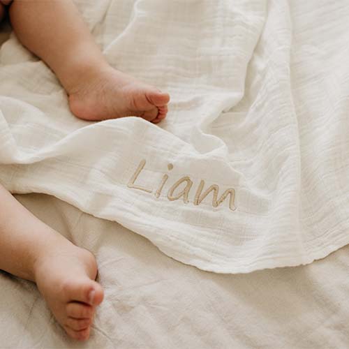 Hydrofiele doek gebroken wit beige tekst