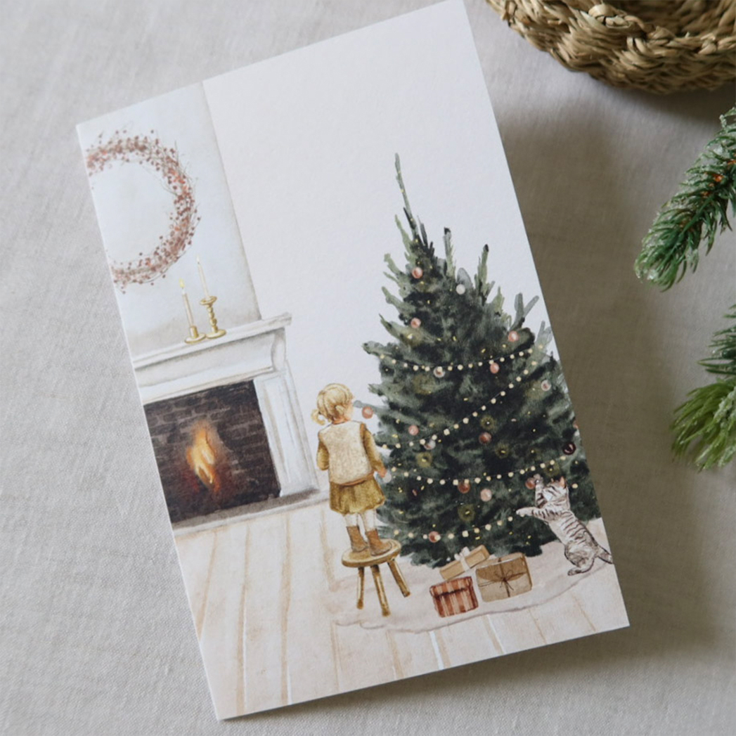 dubbele getekende kerstkaart woonkamer kerstboom meisje