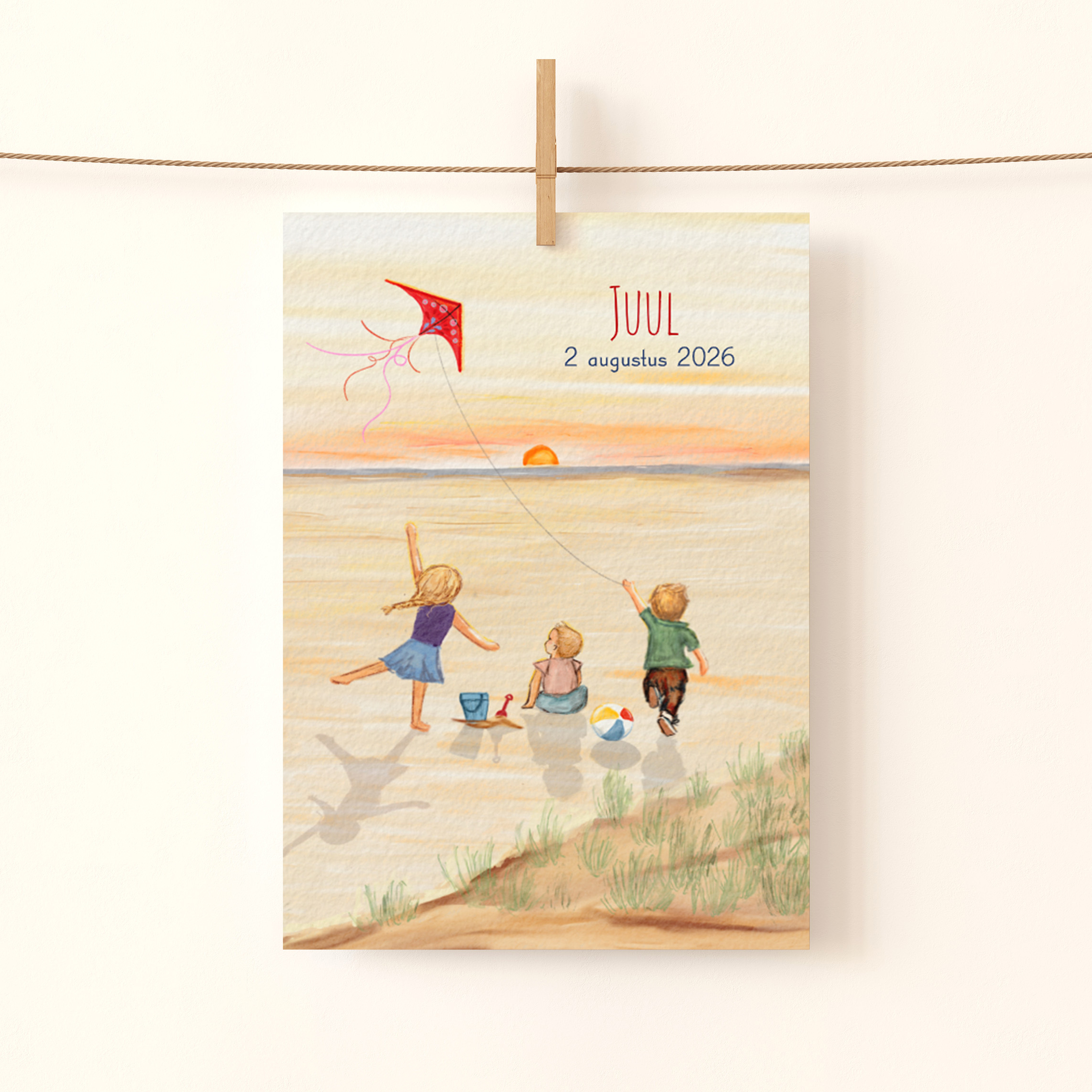 Geboortekaartje vliegeren op het strand