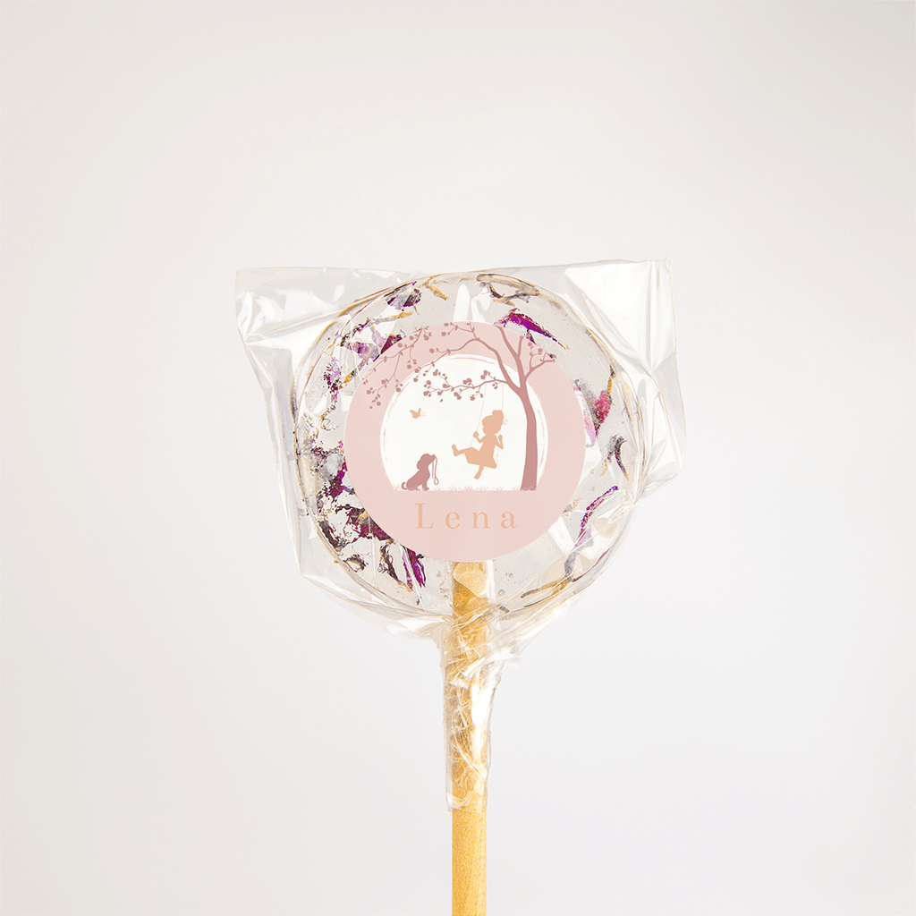 Sticker met silhouetje van meisje op een schommel en hondje