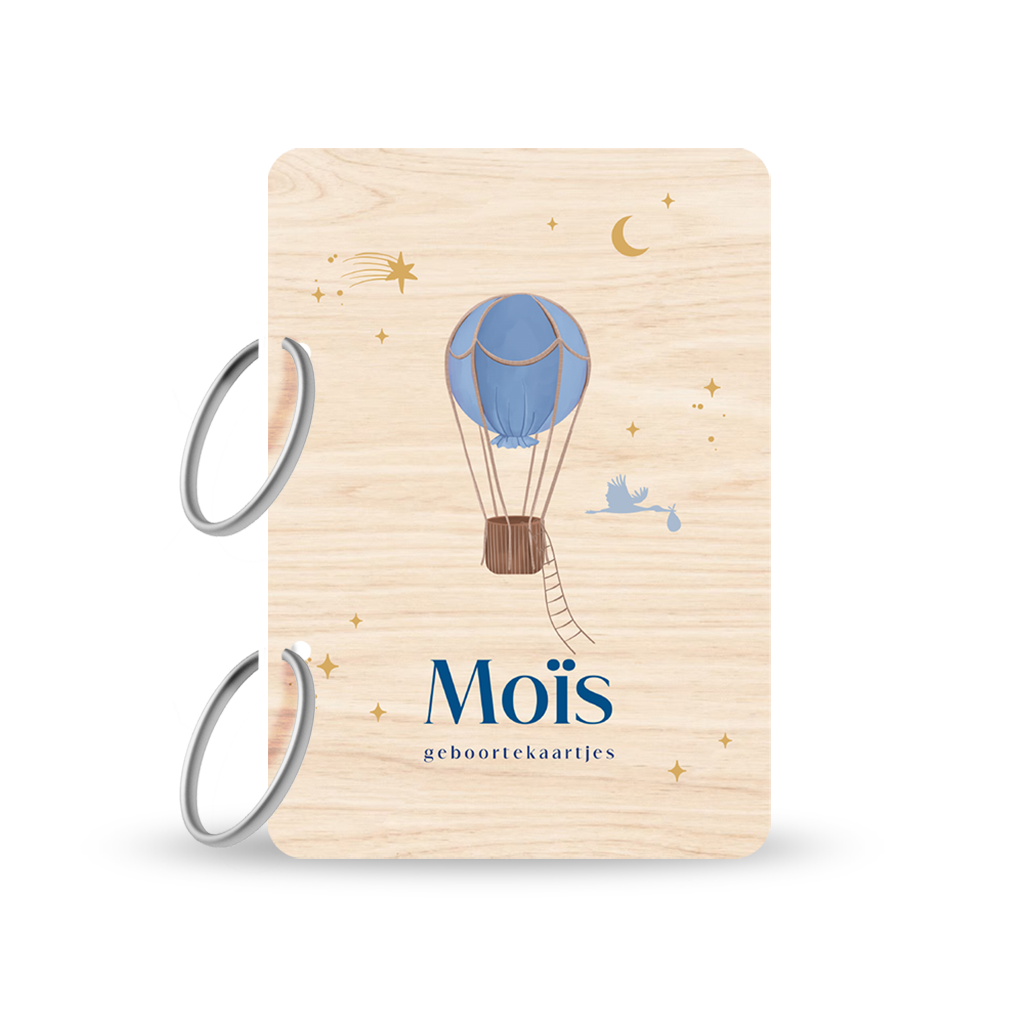 Houten bewaarbundel met blauwe luchtballon en sterrenhemel