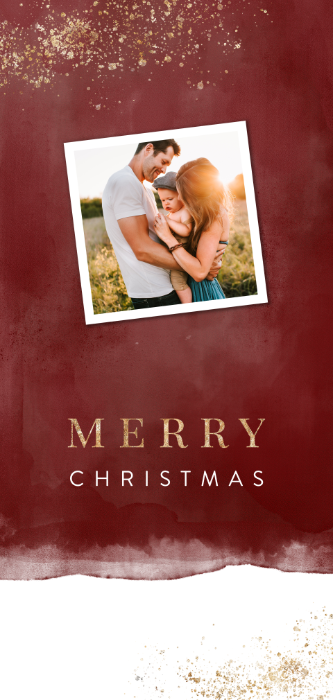 Foto kerstkaart met rode waterverf en goudlook spetters