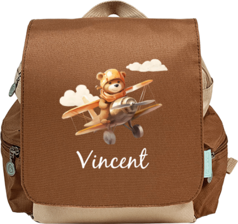 Sac à dos avec ourson dans un avion