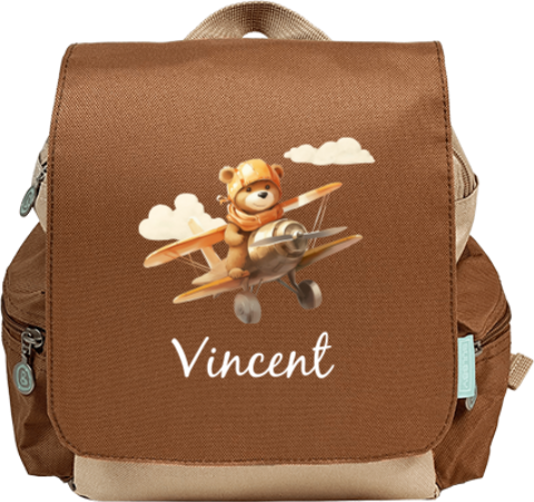 Sac à dos avec ourson dans un avion
